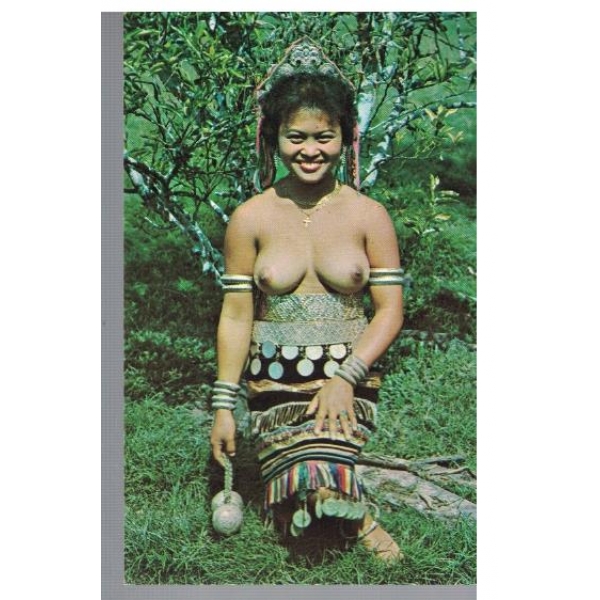 Dayak girl smiling in her national dress